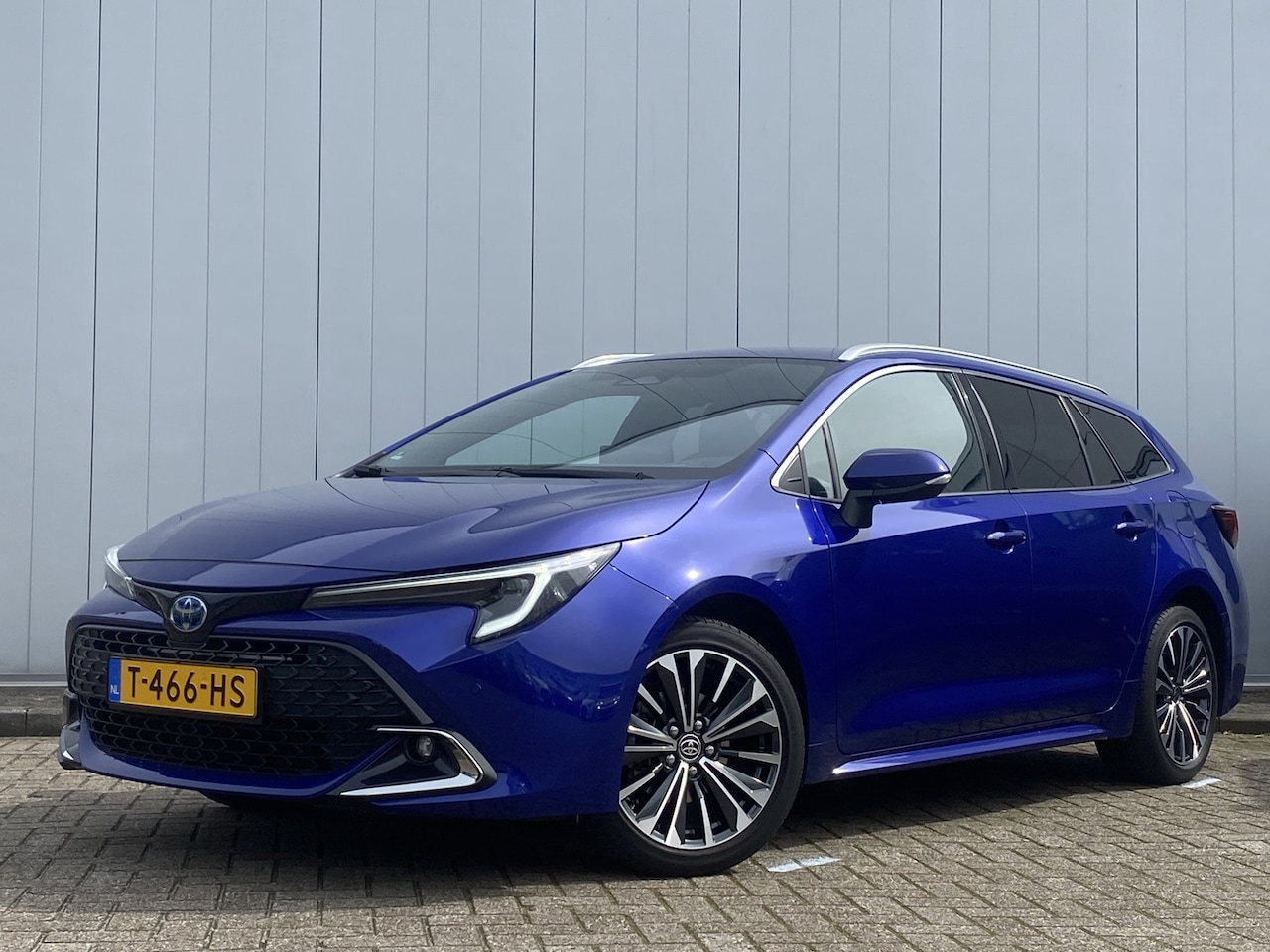 Toyota Corolla Touring Sports - 1.8 Hybrid NL Auto First Edition Navi Clima PDC Stoelverwarming - AutoWereld.nl
