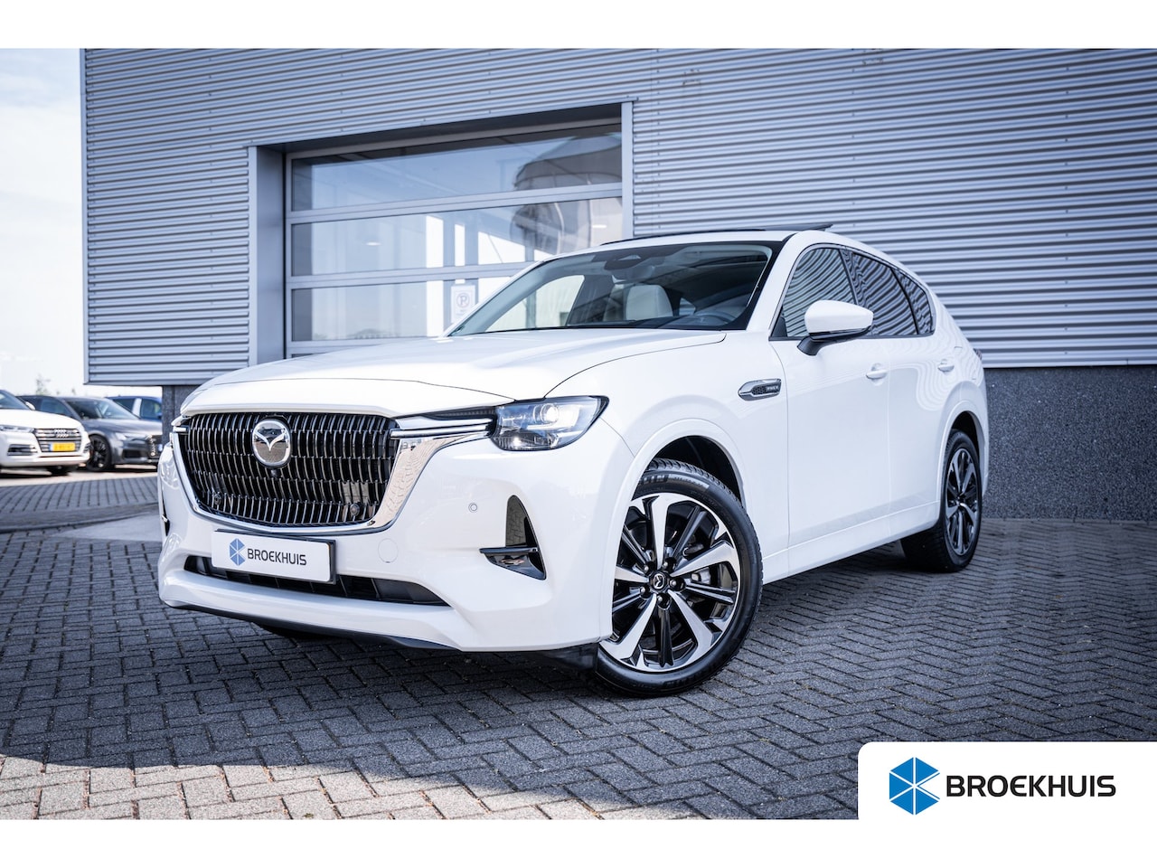 Mazda CX-60 - 2.5 e-SkyActiv PHEV Prime-Line | Dodehoekdetectie met correctie | Trekhaak uitklapbaar - AutoWereld.nl