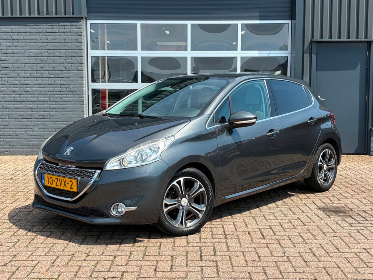 Peugeot 208 - 1.4 VTi Griffe Climate contr. PDC - AutoWereld.nl