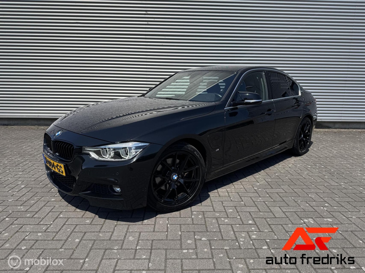 BMW 3-serie - 330e High Executive M-Sport Shadow line - AutoWereld.nl