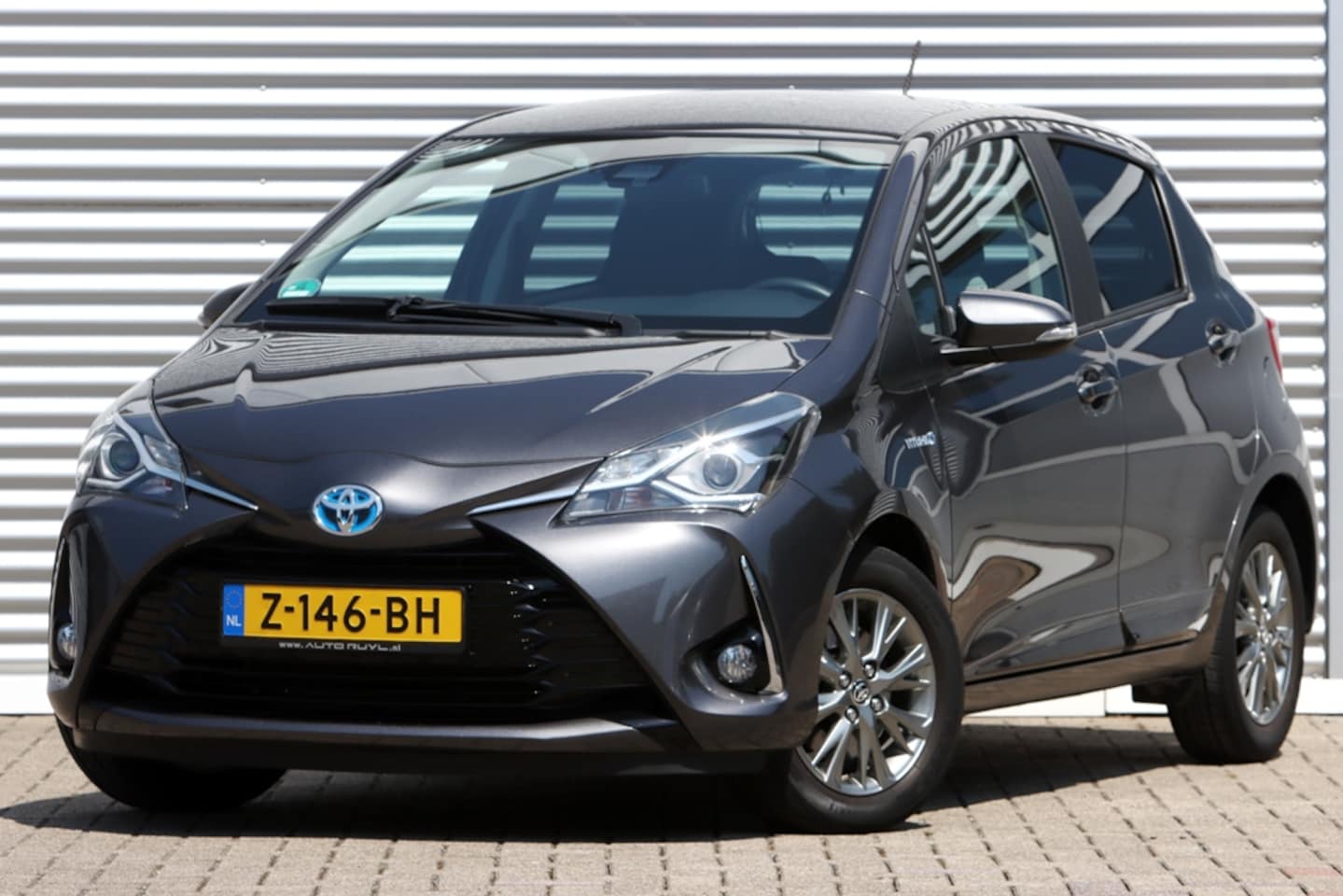 Toyota Yaris - 1.5 Hybrid Design Camera / St. verw. - AutoWereld.nl