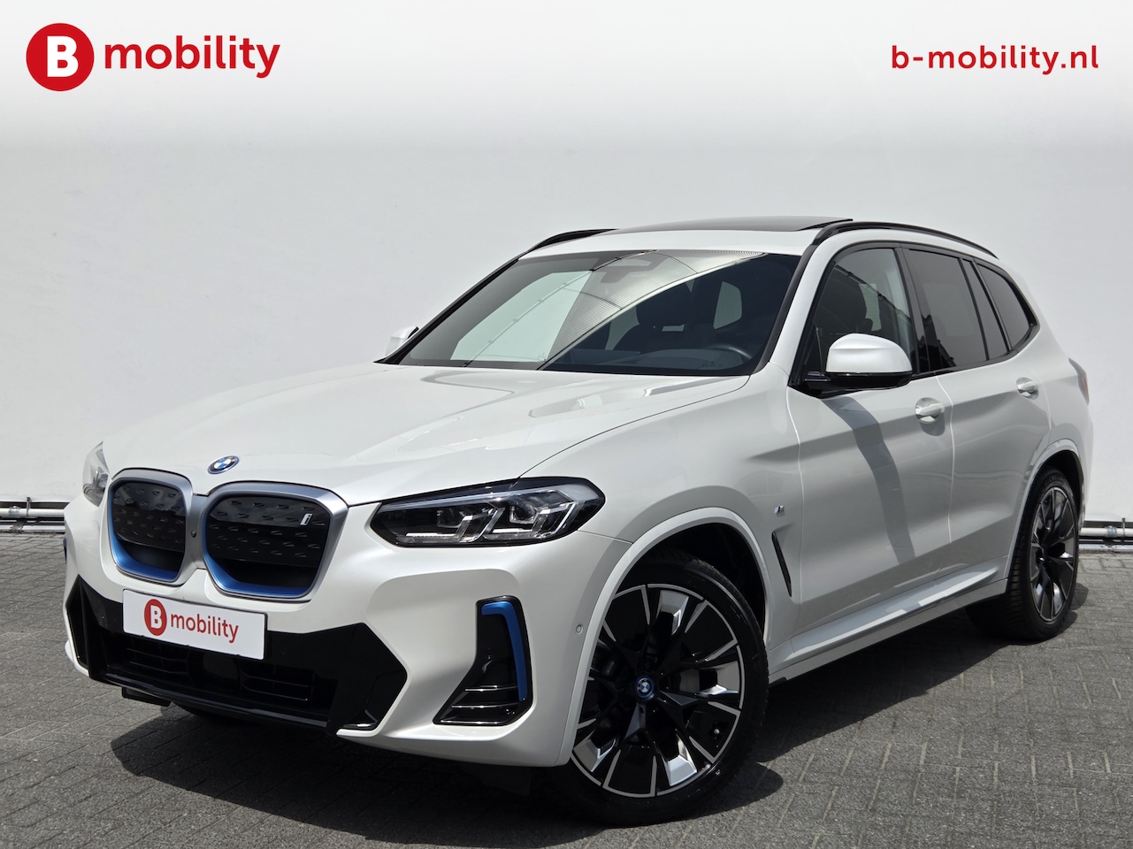BMW iX3 - High Executive M-Sport 80 kWh SOH 98% 'Mineral-Weiss' Trekhaak Panoramdak Harman/Kardon | - AutoWereld.nl
