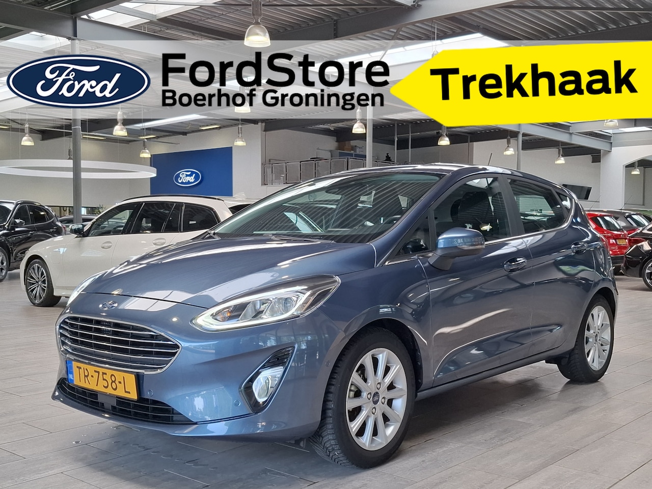 Ford Fiesta - EcoBoost 100pk Titanium | Adapt. Cruise | B&O | Trekhaak | Parkeerhulp | Camera | B&O | Ap - AutoWereld.nl