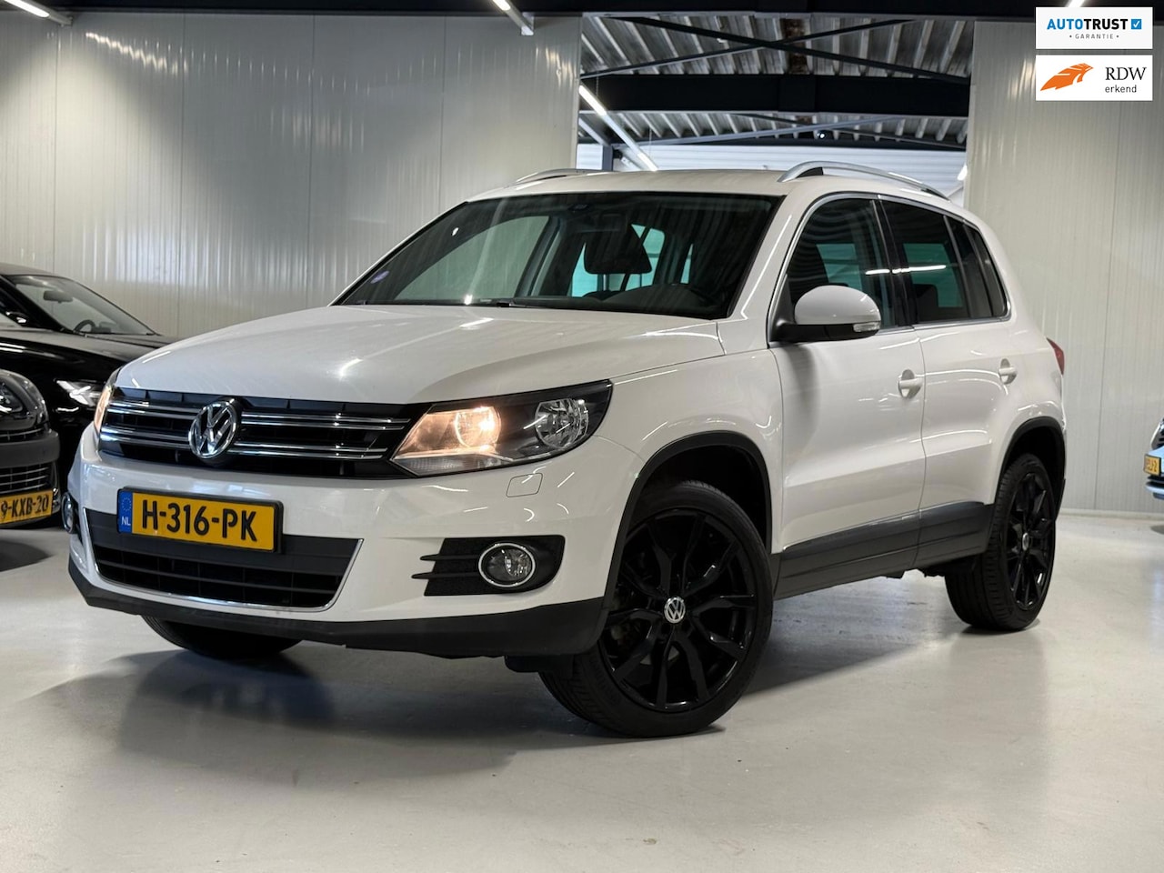 Volkswagen Tiguan - 1.4 TSI 150PK Sport&Style Carplay|Trekhaak! - AutoWereld.nl