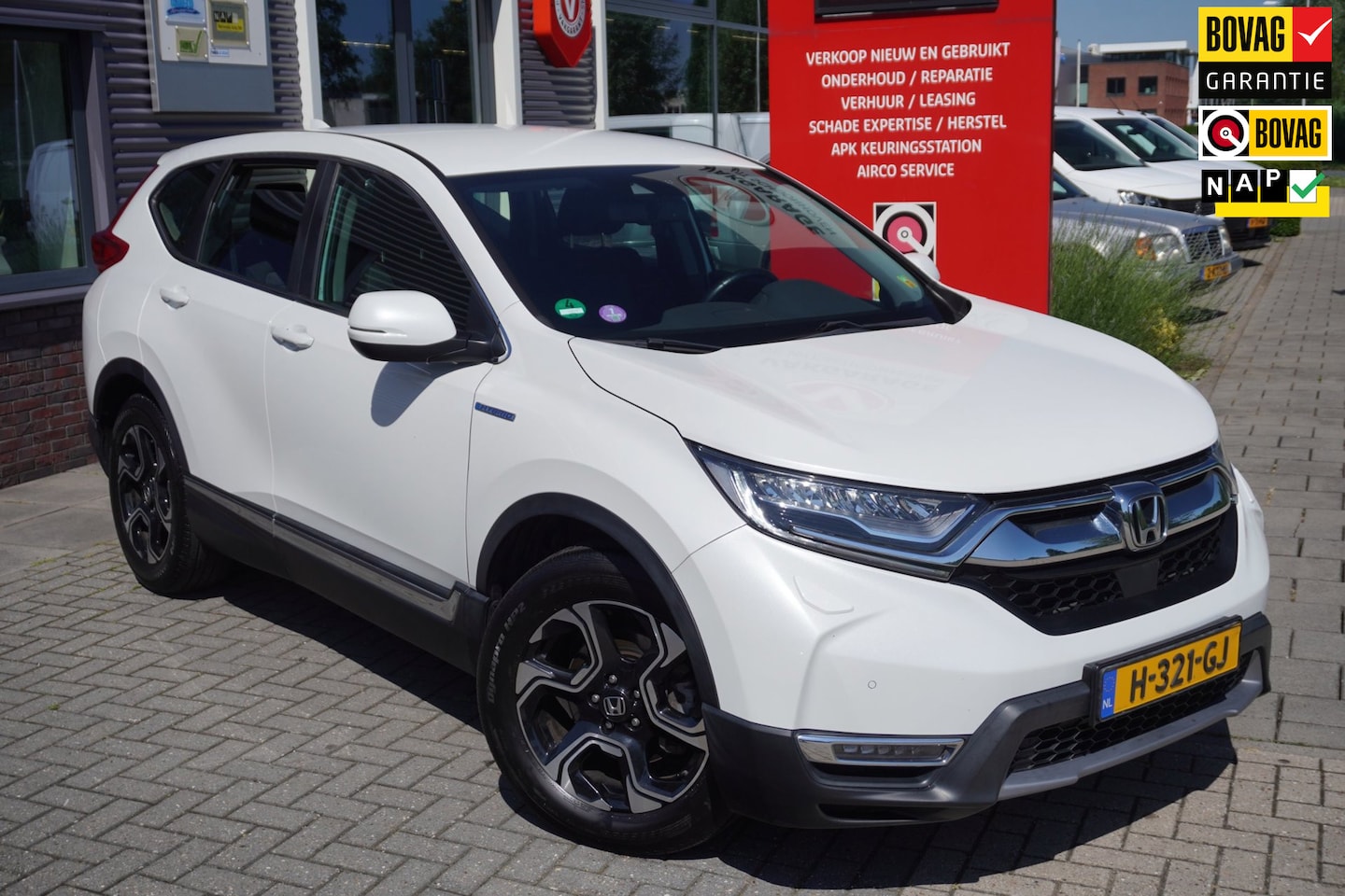 Honda CR-V - 2.0 Hybrid Elegance / Incl winterbanden / Carplay / ACC / Camera / Trekhaak / Stoelverwarm - AutoWereld.nl