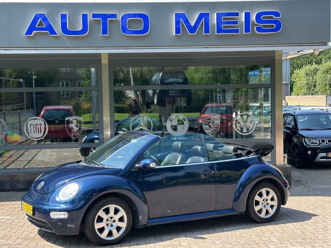 Volkswagen Beetle - 2.0 Highline Cabrio Airco Leder Cruise Camera - AutoWereld.nl