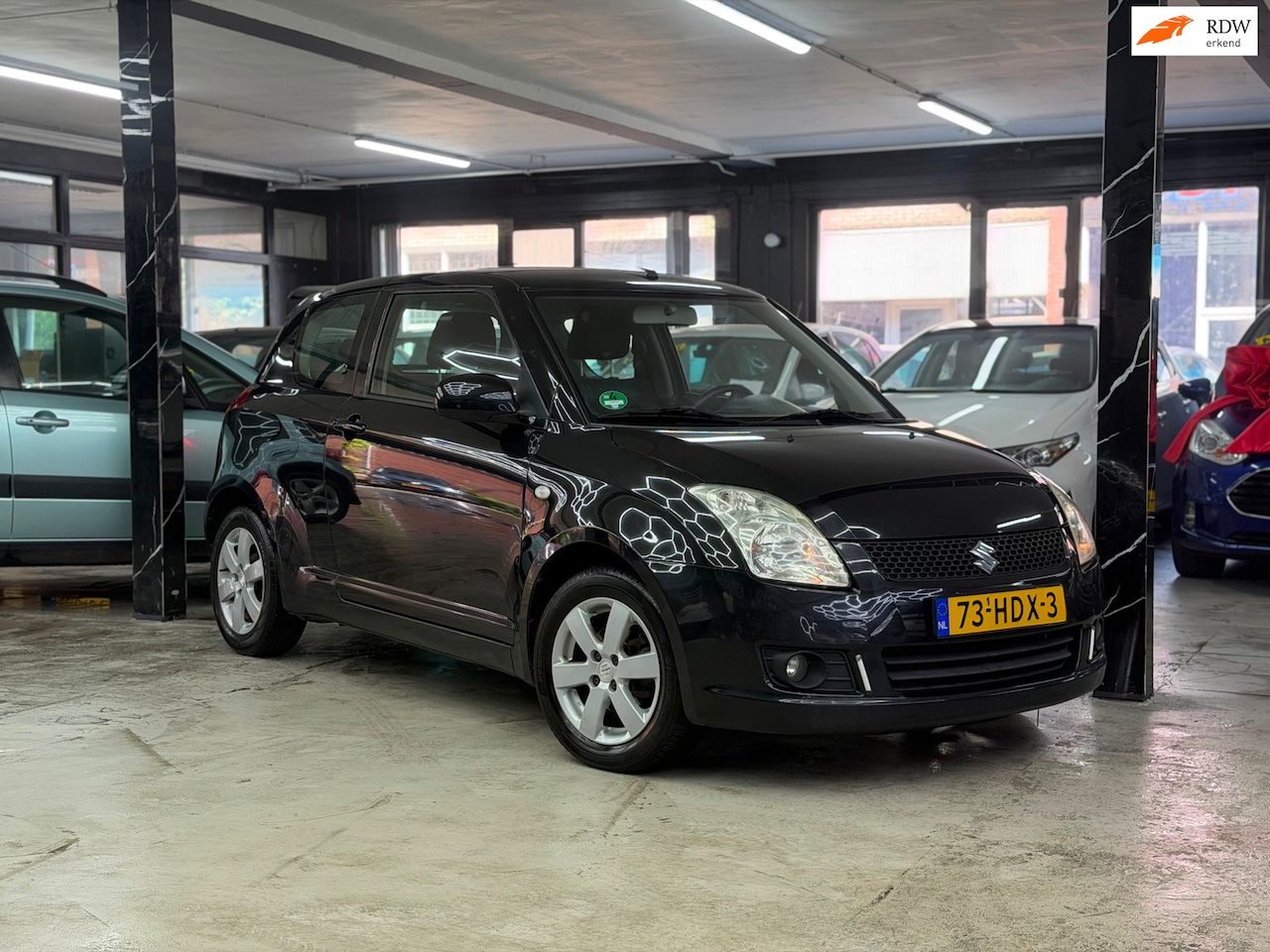 Suzuki Swift - 1.5 Comfort Automaat | Airco | 3dr - AutoWereld.nl