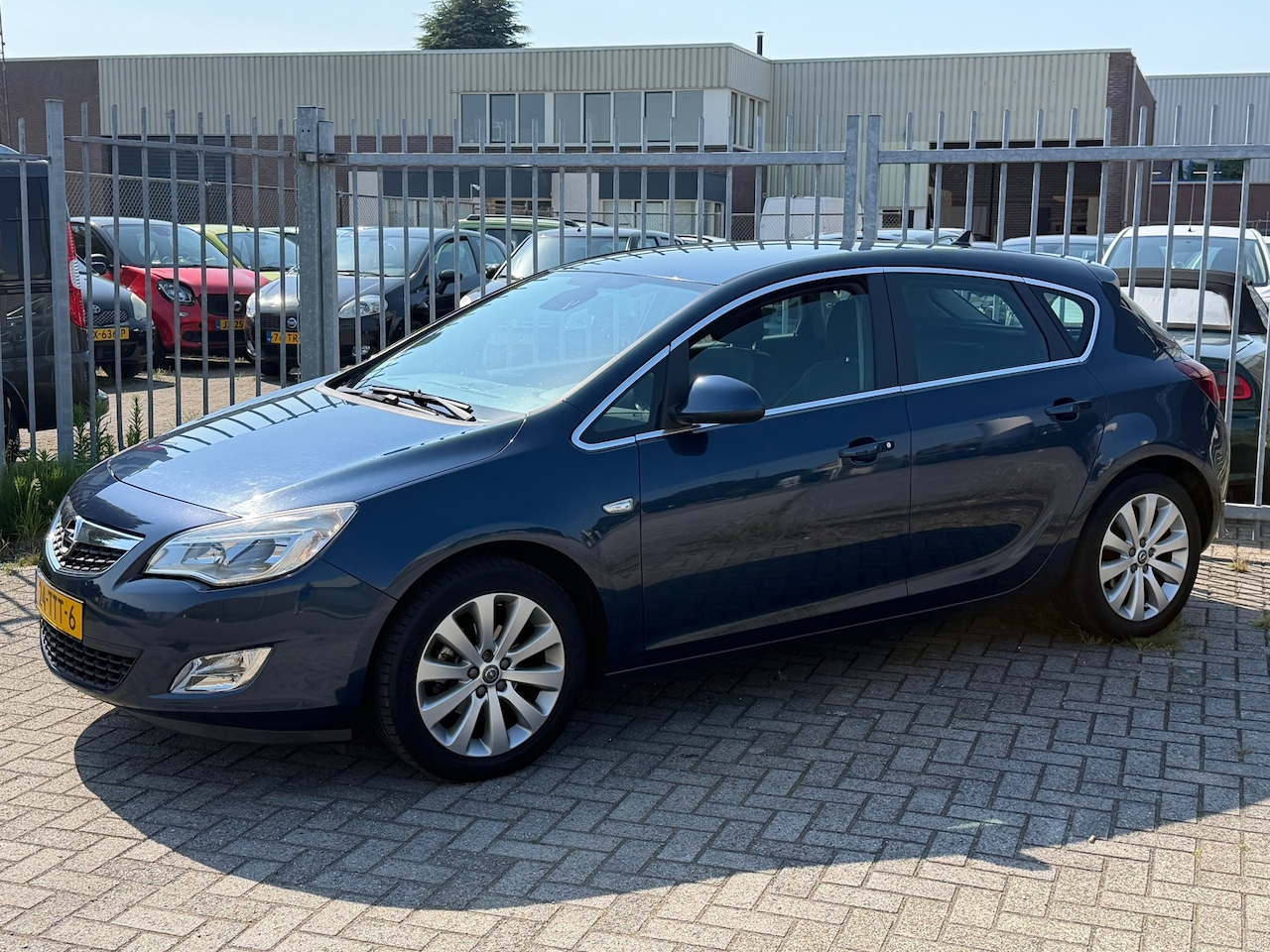 Opel Astra - 1.4 Turbo Cosmo 120PK! NL AUTO NAP 2EIGENAAR! NAVI l Cruise l PDC l Airco l TREKHAAK l LEE - AutoWereld.nl
