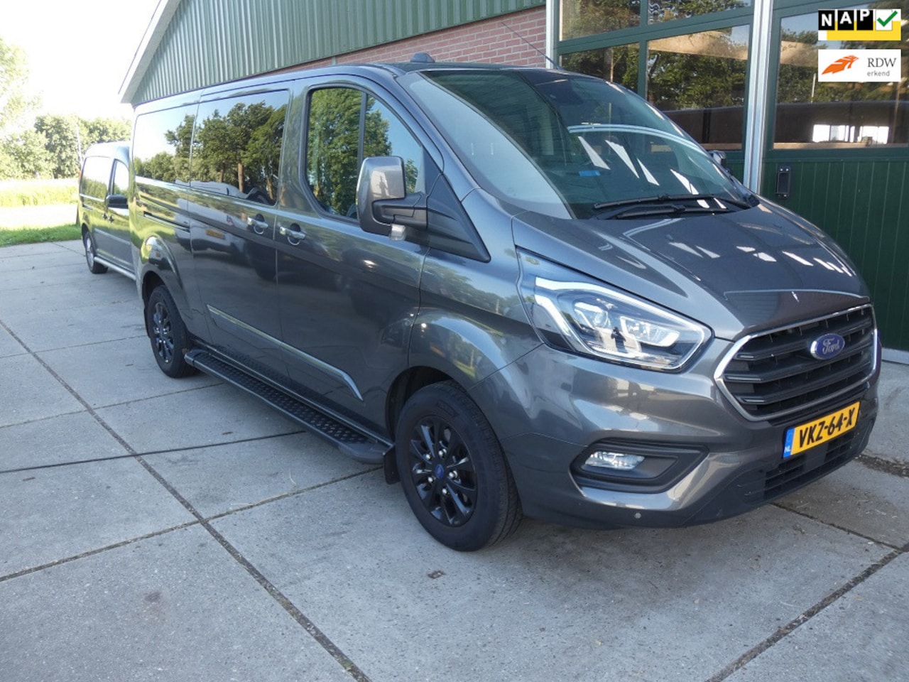 Ford Transit Custom - 320 2.0 TDCI L2H1 dub.cab*platinum edition - AutoWereld.nl