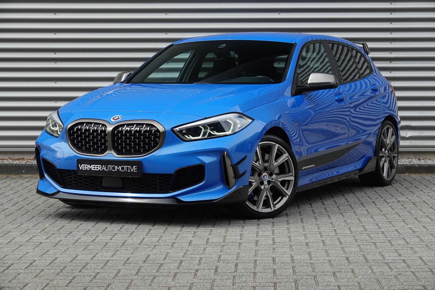 BMW 1-serie - M135i xDrive High Executive | M Performance | HUD | Memory | Stuur/Stoelverw. | - AutoWereld.nl