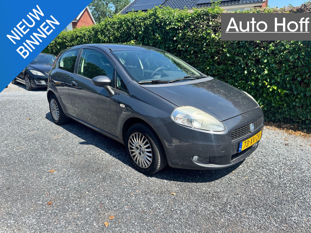 Fiat Grande Punto - 1.4 Dynamic | Airco | Cruise Control | Elekt. Ramen | Trekhaak | APK tot 03-02-2027! - AutoWereld.nl