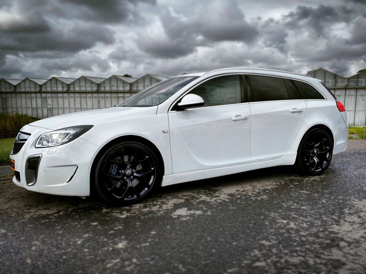 Opel Insignia Sports Tourer - 2.8 T OPC 4x4 - AutoWereld.nl