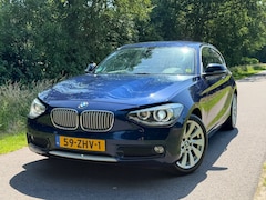 BMW 1-serie - 116i Upgrade Edition | Leder + Navi + Cruise + Airco Nu € 6.999,