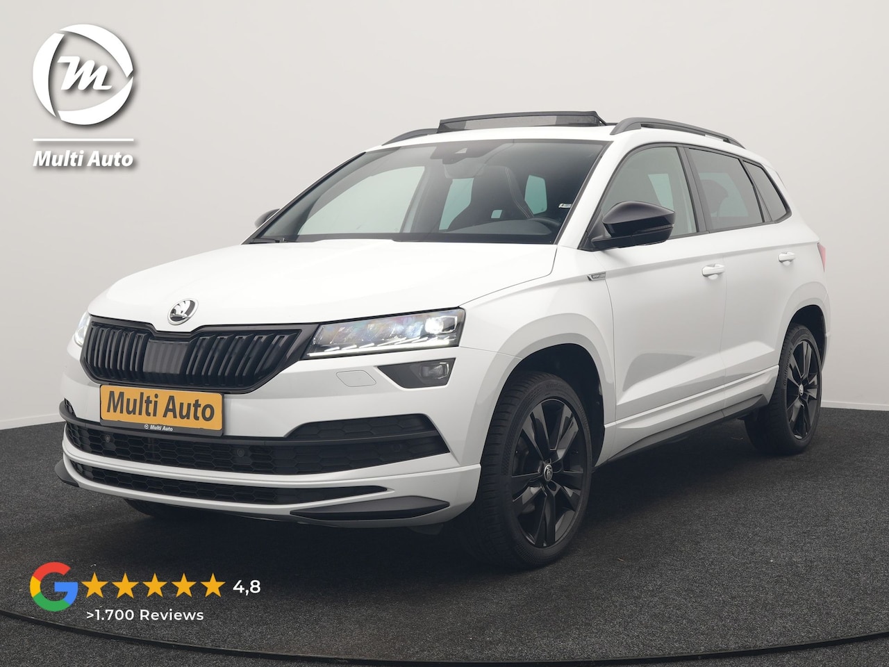 Skoda Karoq - 1.5 TSI ACT Sportline DSG 150pk Dealer O.H | Panodak | Adaptive Cruise | Camera | RS Sport - AutoWereld.nl