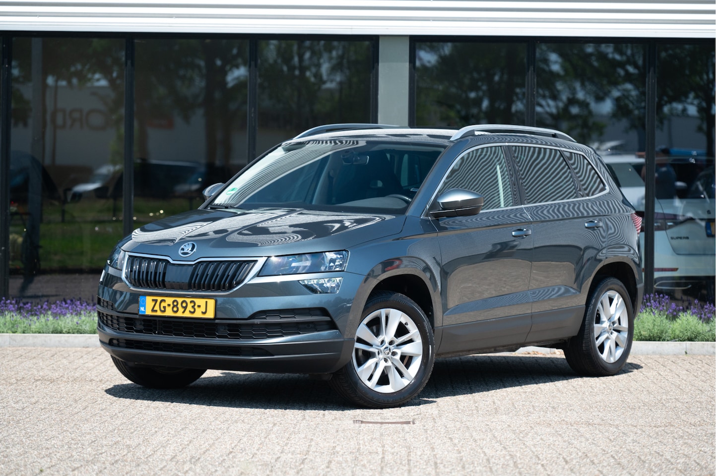 Skoda Karoq - 1.5 TSI ACT Style DSG | Trekhaak | Navi | Camera | ACC | Sportstoelen - AutoWereld.nl