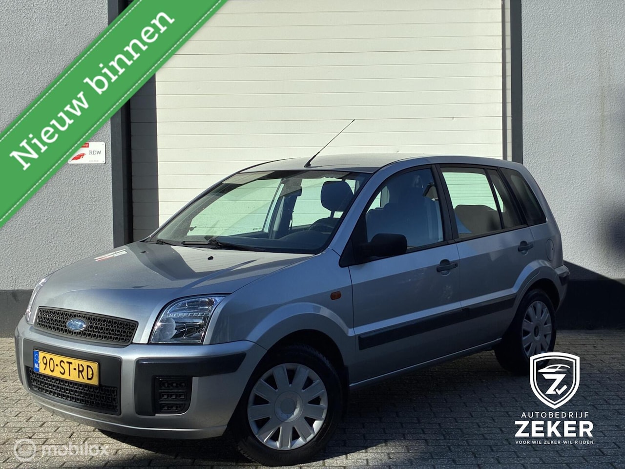 Ford Fusion - 1.4-16V Champion airco / trekhaak / nieuwe apk - AutoWereld.nl