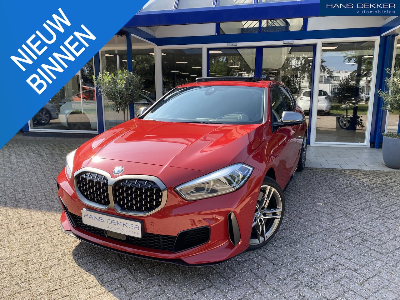 BMW 1-serie - M135i xDrive High Executive Edition Head up / Stuur & Stoel verwarming / ledere kuipstoele - AutoWereld.nl