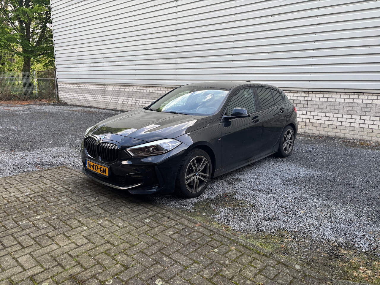 BMW 1-serie - 118i High Executive - AutoWereld.nl