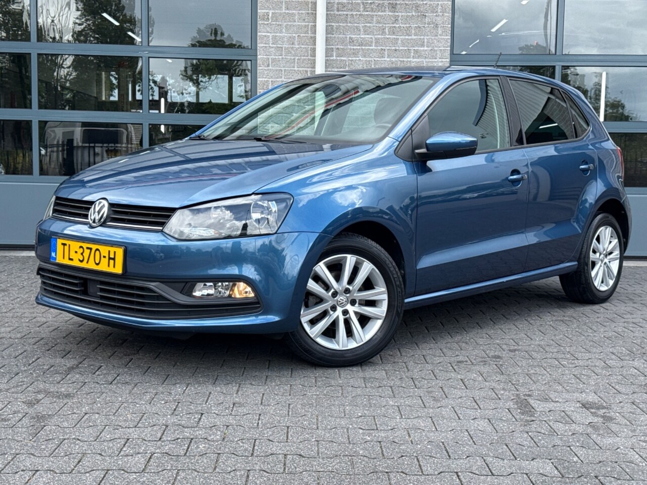 Volkswagen Polo - 1.2 TSI Comfortline Business R |CLIMA|NAVIGATIE| - AutoWereld.nl