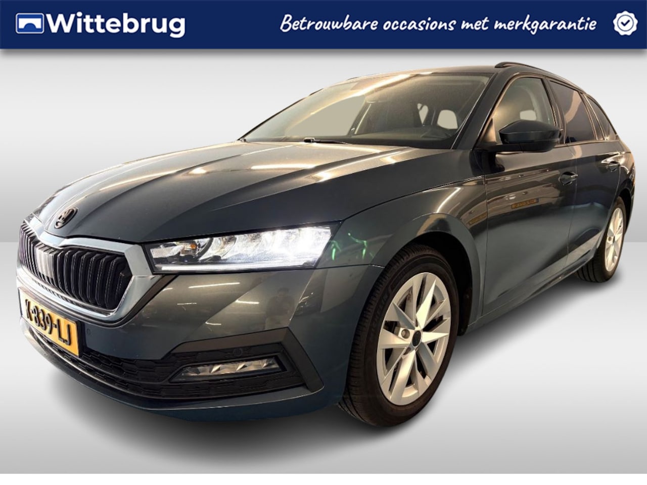 Skoda Octavia Combi - 1.0 e-TSI Business Edition / App Connect / Navi / Trekhaak afn. - AutoWereld.nl