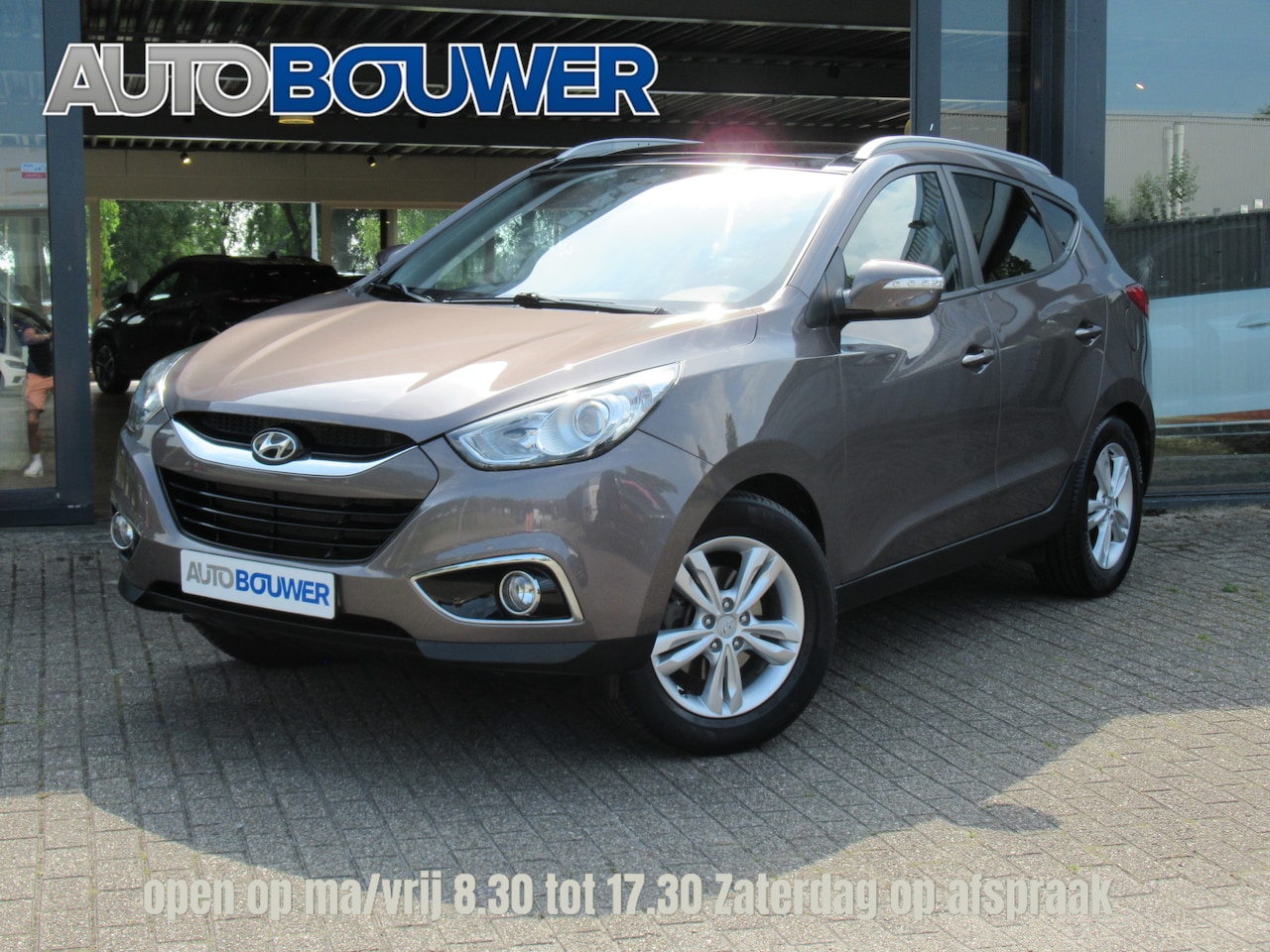 Hyundai ix35 - 2.0i Business Edition 2e eigen | panodak | navi | camera | cruise | 1900 KG tr.gewicht - AutoWereld.nl