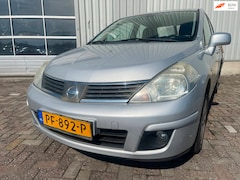 Nissan Tiida - A01 - Achter Schade - WOK