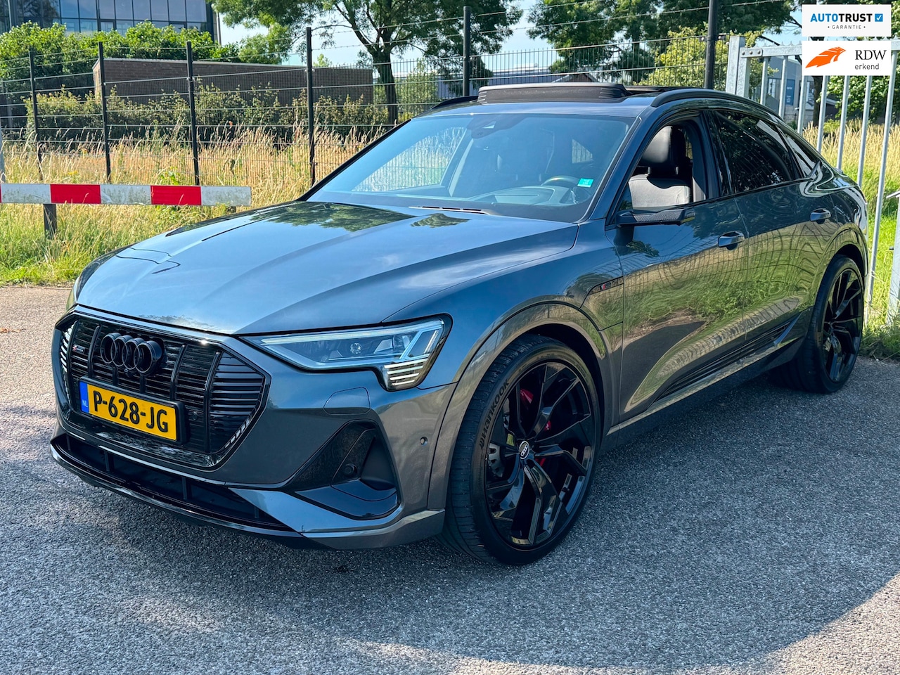 Audi e-tron Sportback - 55 quattro 95 kWh S-Line Panodak Sfeer Luchtvering 23inch - AutoWereld.nl