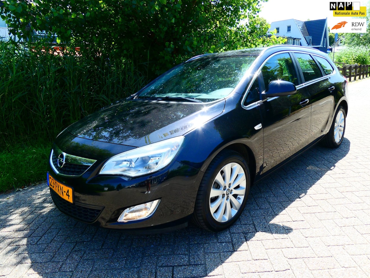 Opel Astra Sports Tourer - 1.4 Turbo 140pk Clima Cruise Navi Trekhaak 1200kg. - AutoWereld.nl