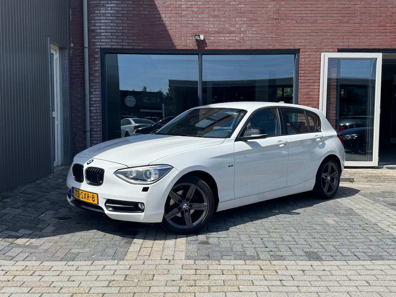 BMW 1-serie - 116i Sport | Navi | Clima | Cruise | PDC | - AutoWereld.nl
