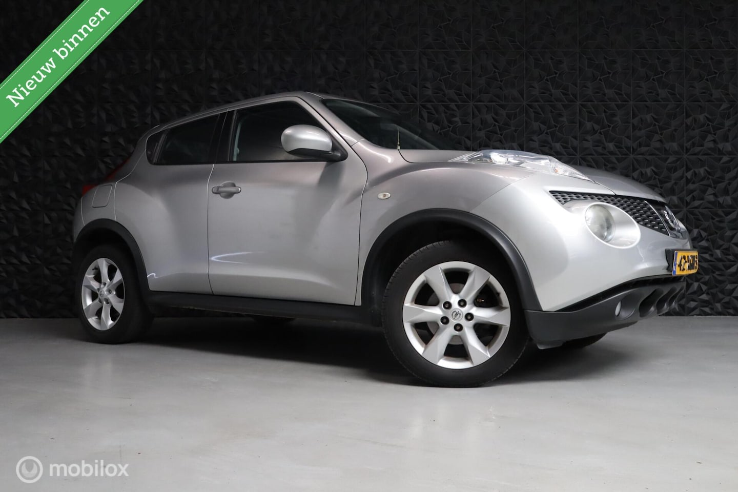 Nissan Juke - 1.6 Acenta Eco | Camera | Cruise | NAV | AC | BT - AutoWereld.nl