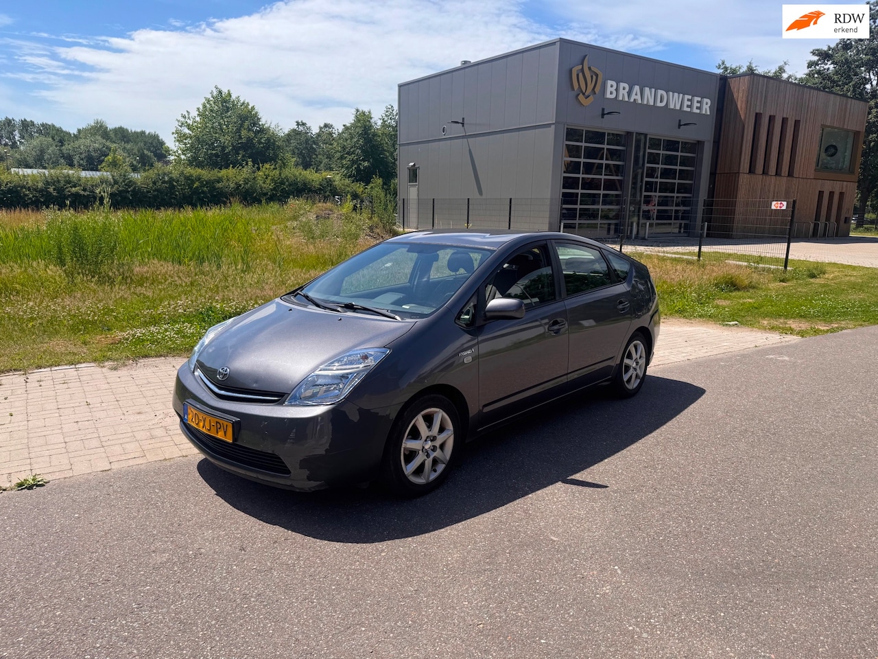 Toyota Prius - 1.5 VVT-i Comfort Clima.Navi - AutoWereld.nl