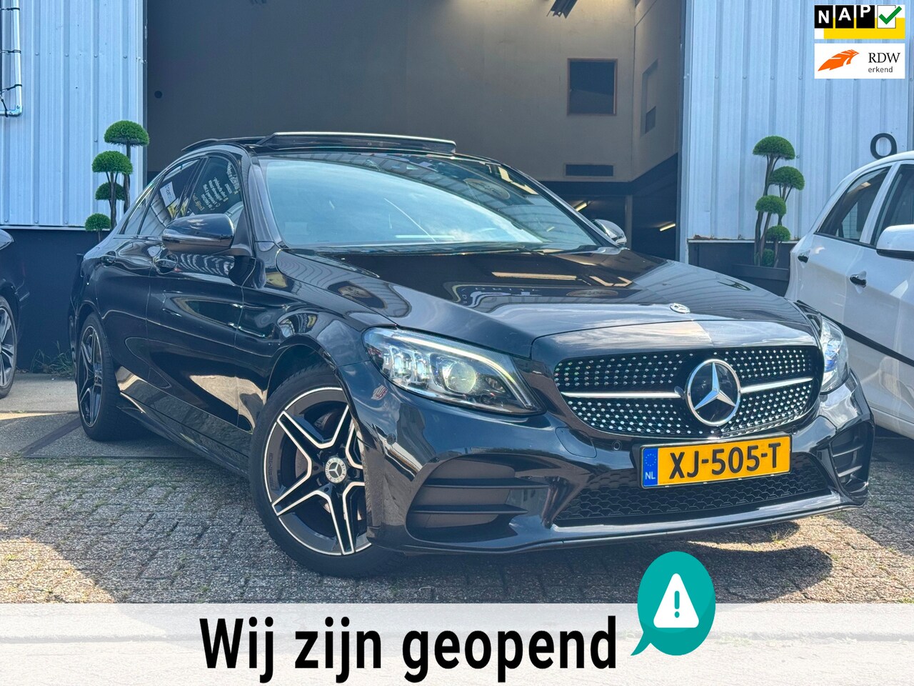 Mercedes-Benz C-klasse - 180 | AMG LINE | ZWART | 2019 | PANO | NETTE AUTO | APK | NL | NAP | - AutoWereld.nl