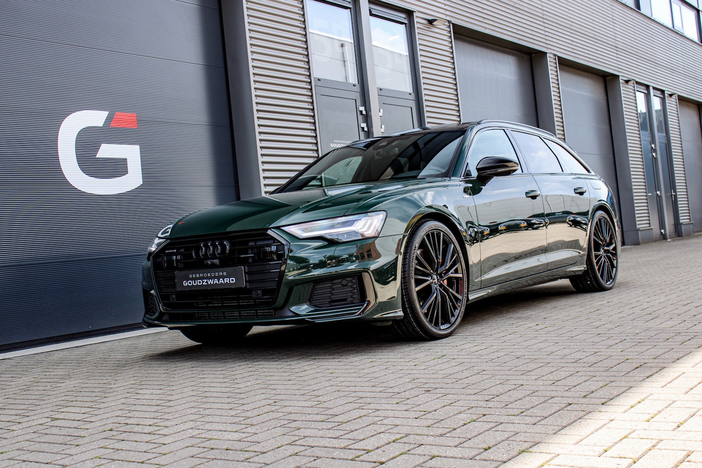 Audi A6 Avant - 55 TFSI e quattro Competition | Individual Goodwood Green | Pano | Massage | B&O | HUD | T - AutoWereld.nl