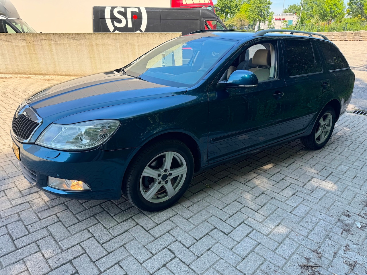 Skoda Octavia Combi - 1.4 TSI Elegance Business Line Automaat sport sound - AutoWereld.nl