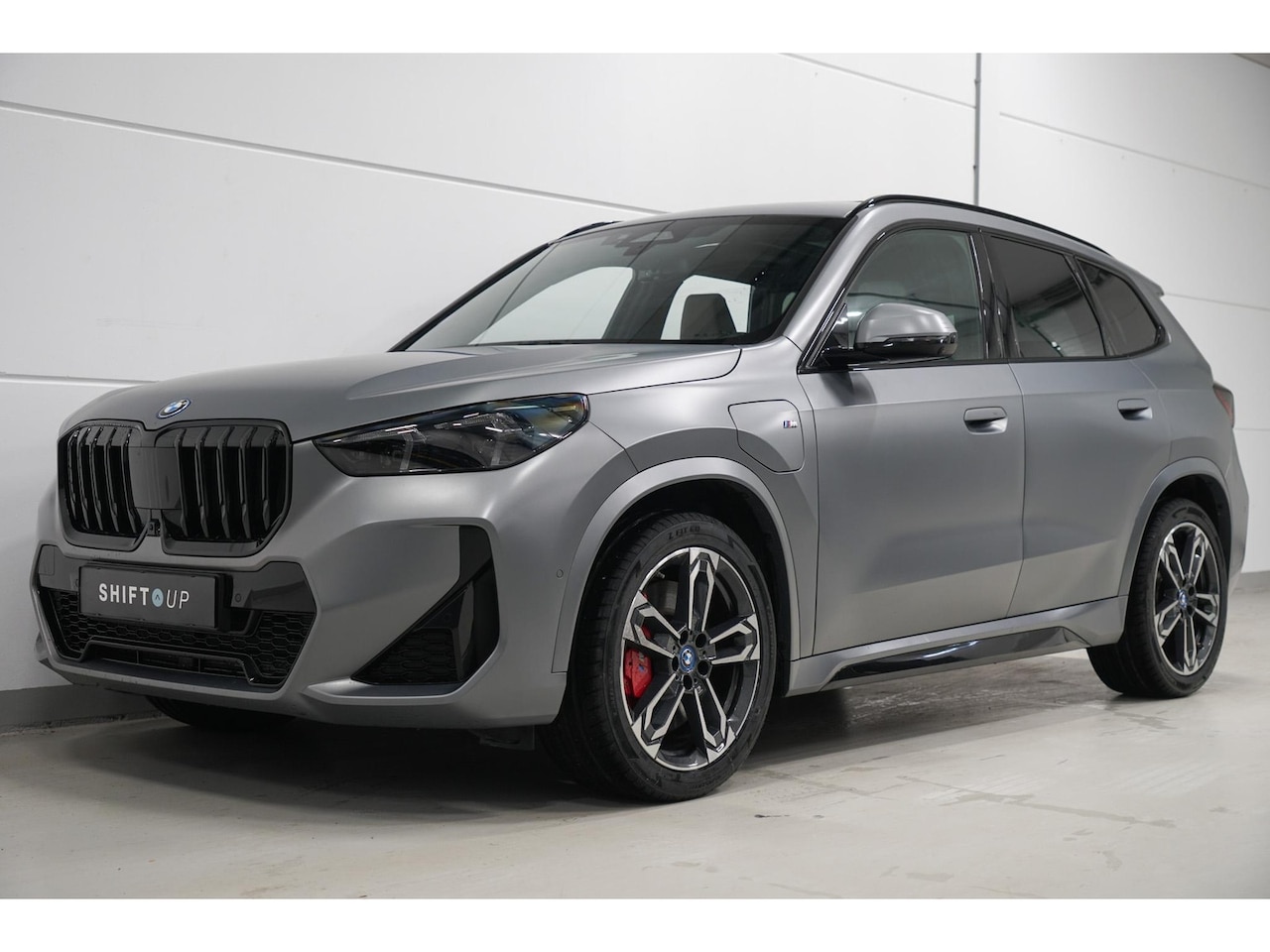BMW X1 - xDrive30e M-Sport | Panoramadak | Harman Kardon | Elektr. Trekhaak - AutoWereld.nl