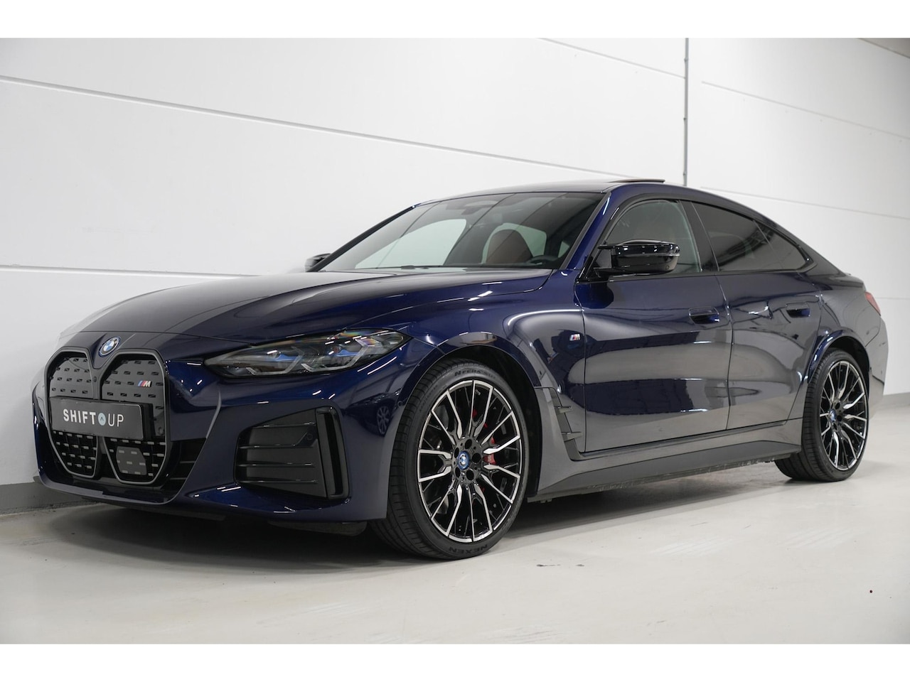 BMW i4 - M50 84 kWh Harman Kardon | Schuifdak | CoPilot - AutoWereld.nl