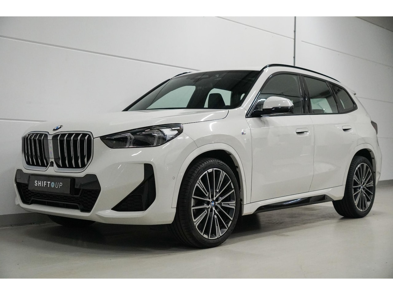 BMW X1 - sDrive18i M-Sport | Panoramadak | Comfort Access - AutoWereld.nl