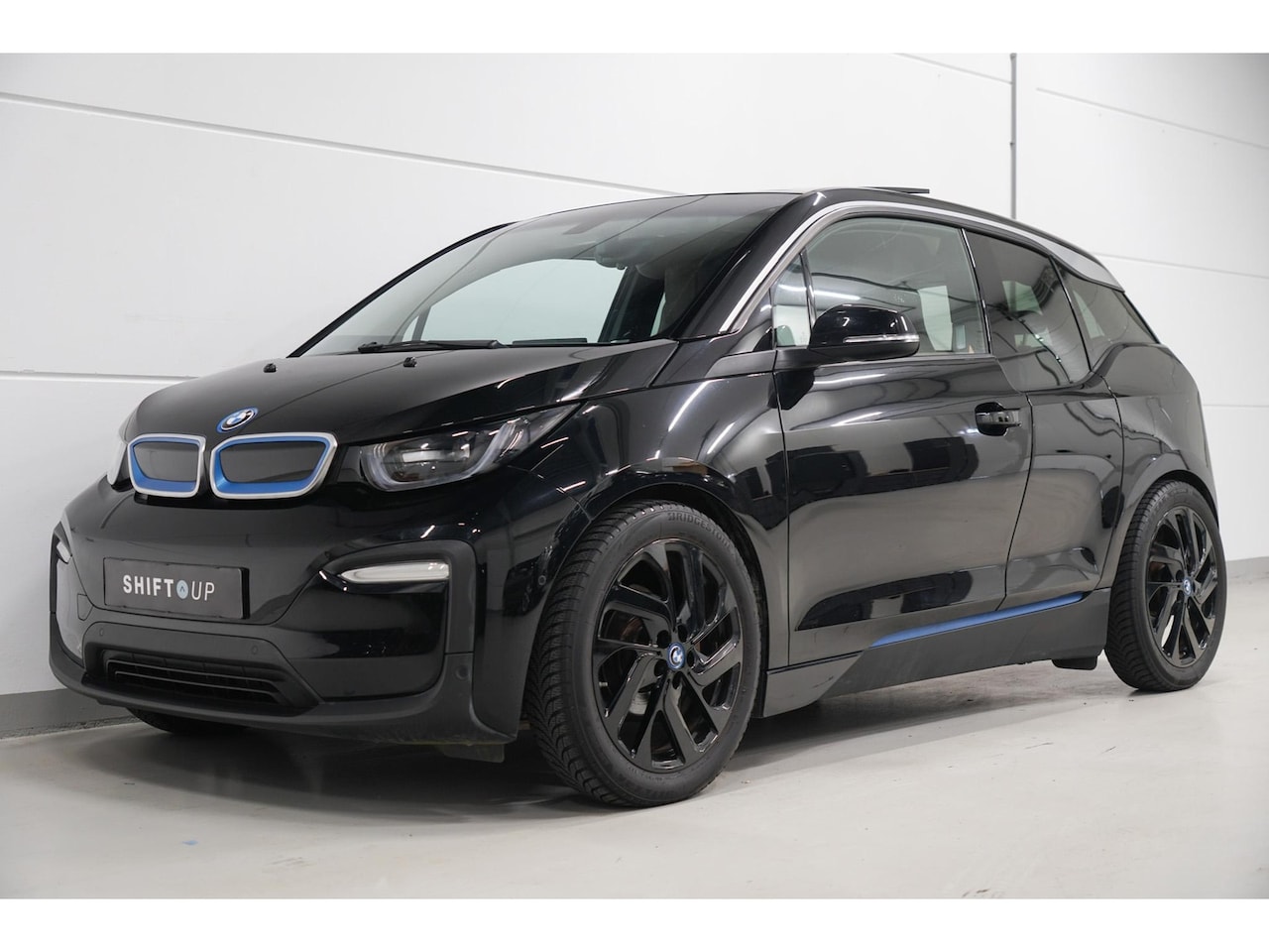 BMW i3 - 94Ah 33 kWh Schuifdak | Harman Kardon | Camera - AutoWereld.nl
