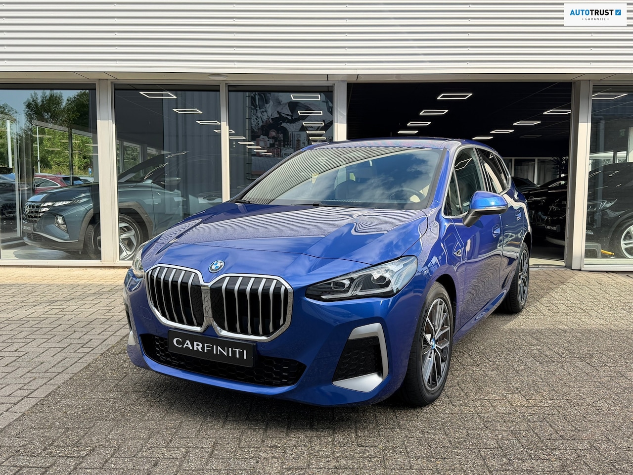 BMW 2-serie Active Tourer - 225e xDrive M SPORT | Navigatie | Cruise | Leder | Camera | Clima | 18". - AutoWereld.nl