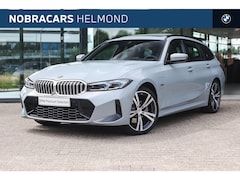 BMW 3-serie Touring - 330e xDrive Automaat / Panoramadak / Trekhaak / Sportstoelen / Achteruitrijcamera / Adapti