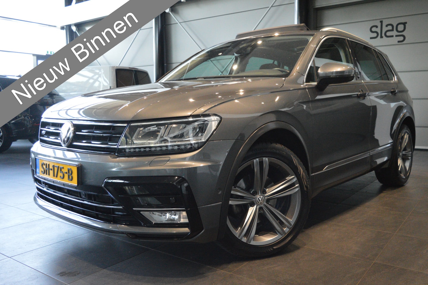 Volkswagen Tiguan - 1.4 TSI ACT R-LINE navi pano camera trekhaak 150 pk !! - AutoWereld.nl