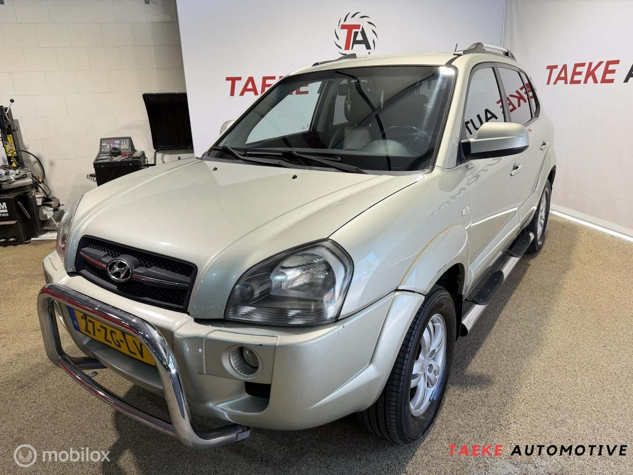Hyundai Tucson - 2.0i Style Premium Clima/Cruise/Trekhaak/Nap - AutoWereld.nl