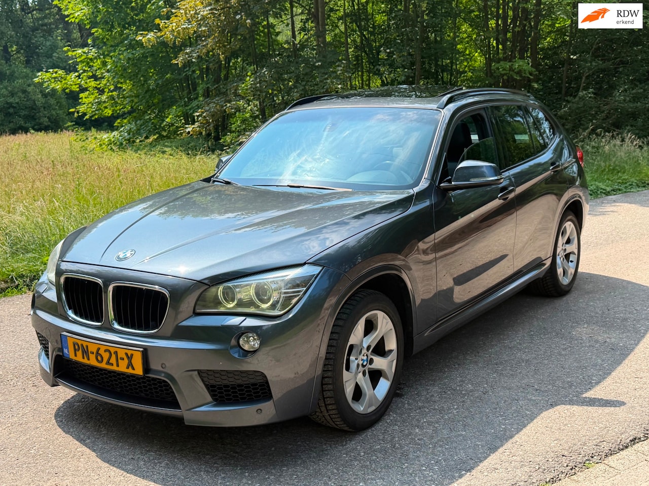 BMW X1 - XDrive25d High Executive M-PAKKET PANO LEDER 2013 - AutoWereld.nl