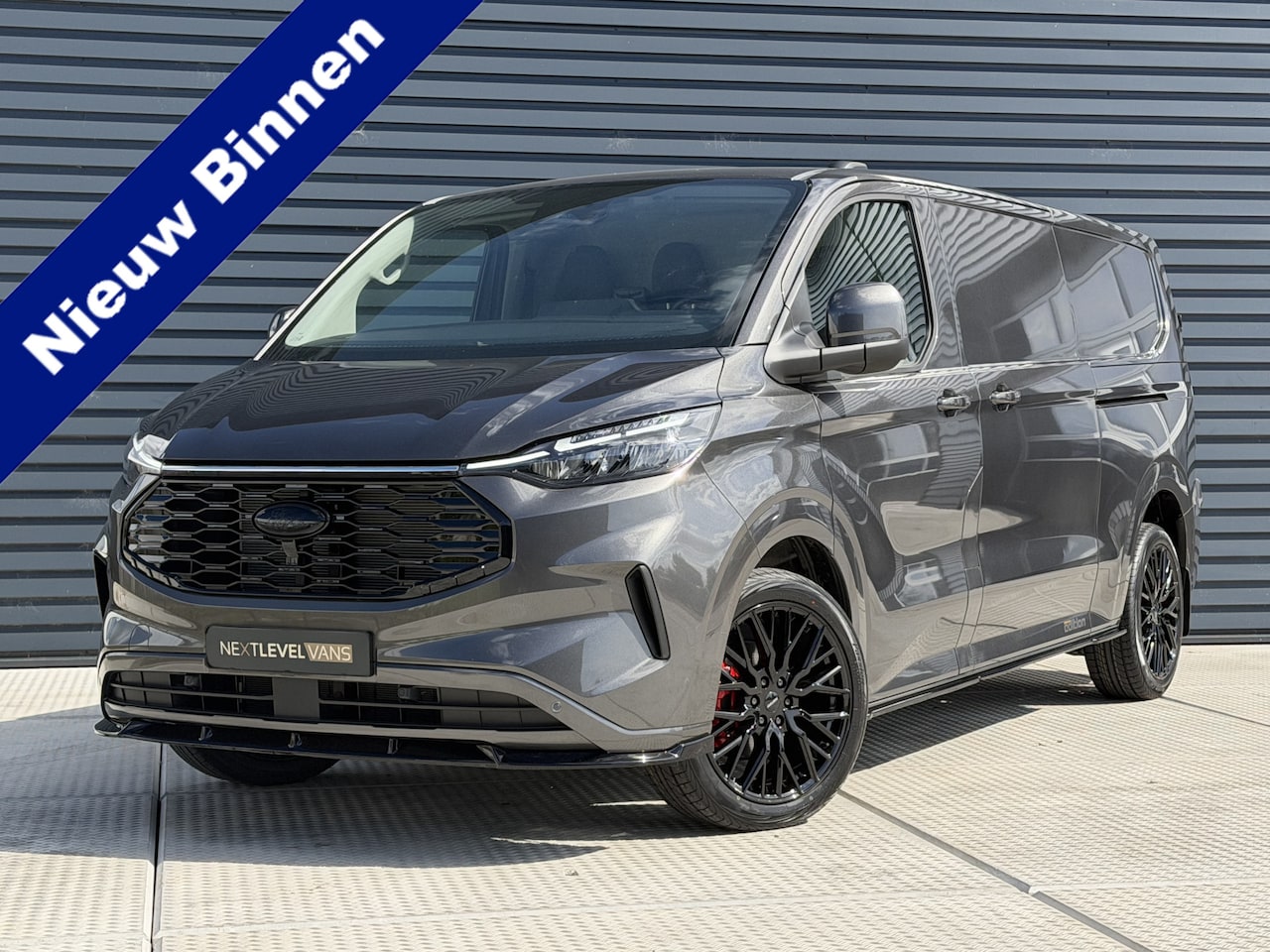 Ford E-Transit Cust. - 340 L2H1 Limited 71 kWh NEXT LEVEL 2 x schuifdeur / Camera - AutoWereld.nl