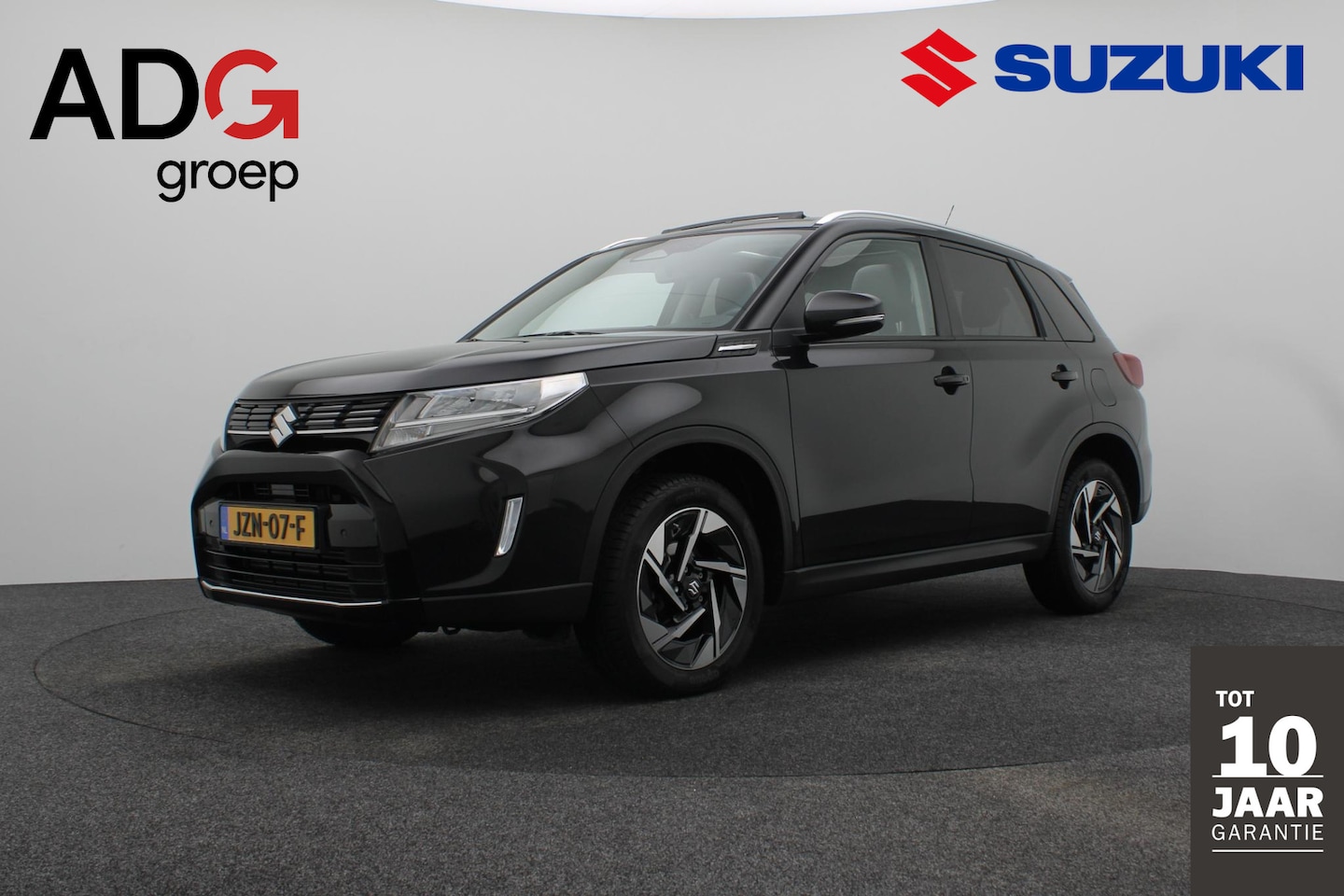 Suzuki Vitara - 1.4 Boosterjet Style Smart Hybrid | Panoramadak | Half Leder | Parkeercamera | navigatiesy - AutoWereld.nl