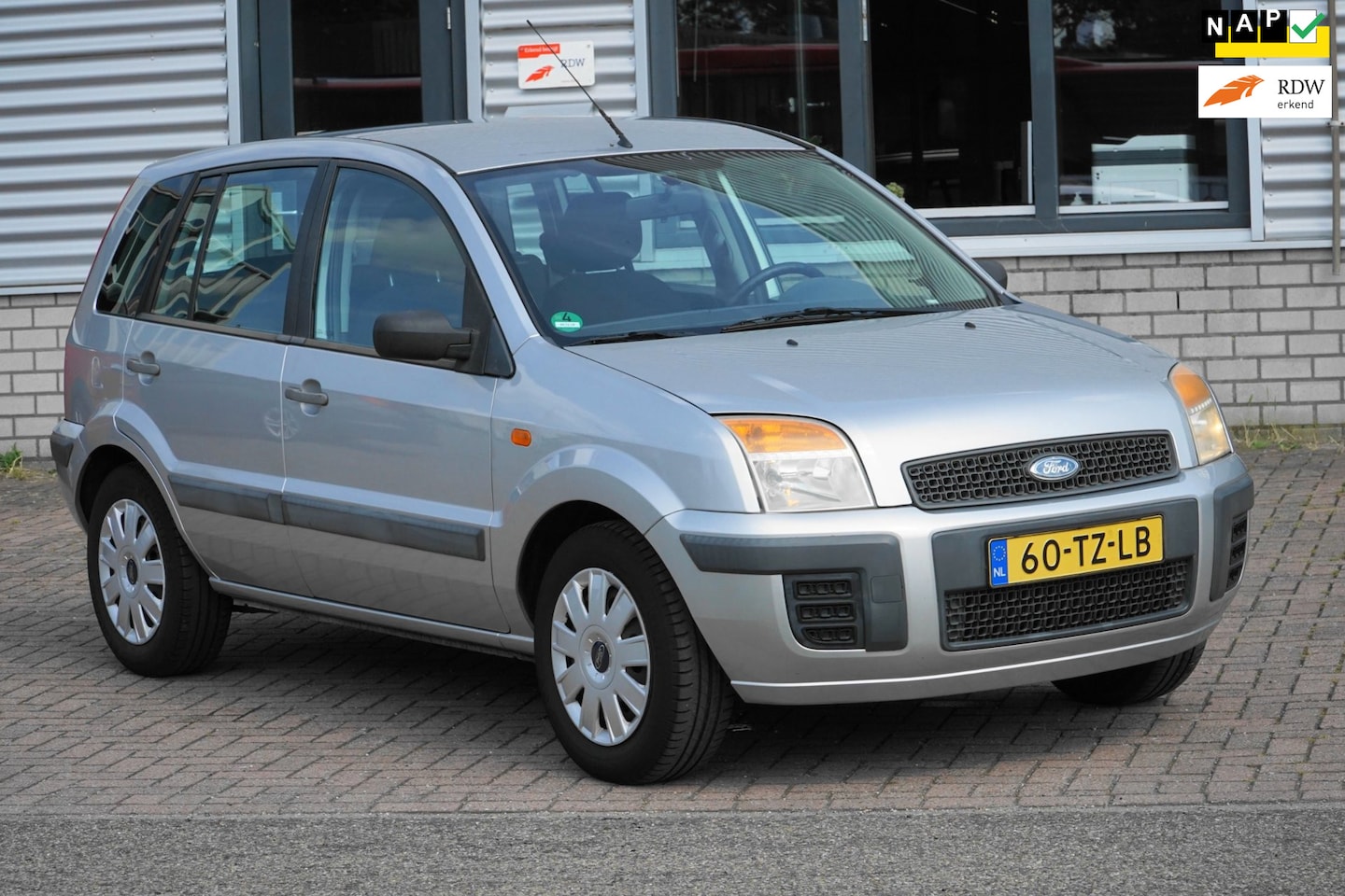Ford Fusion - 1.4-16V Champion AIRCO TREKHAAK - AutoWereld.nl