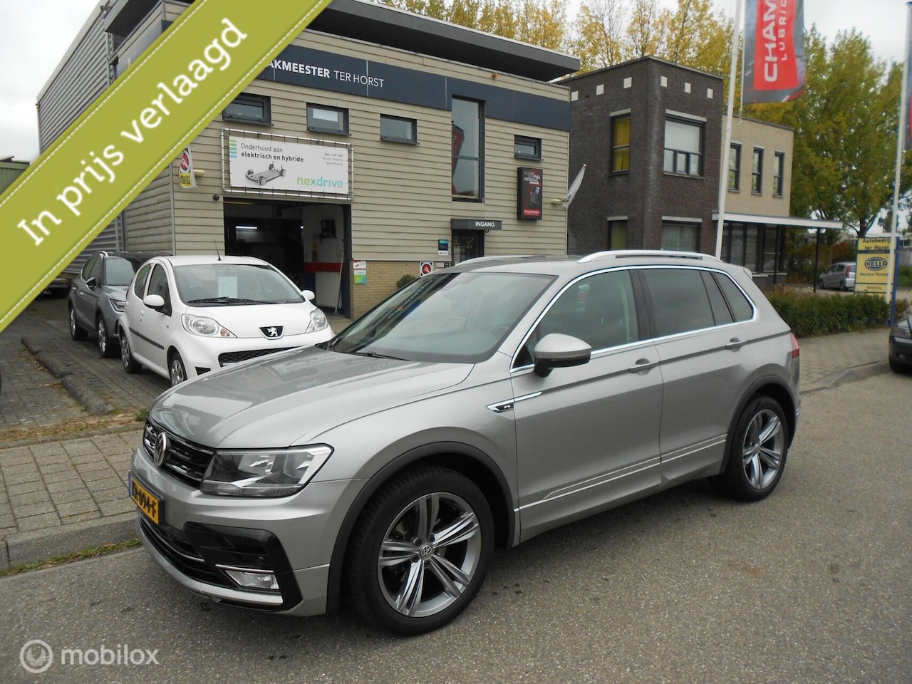 Volkswagen Tiguan - 1.4 TSI Connected Series 1.4 TSI Connected Series, R-Line, Apple Car Play - AutoWereld.nl