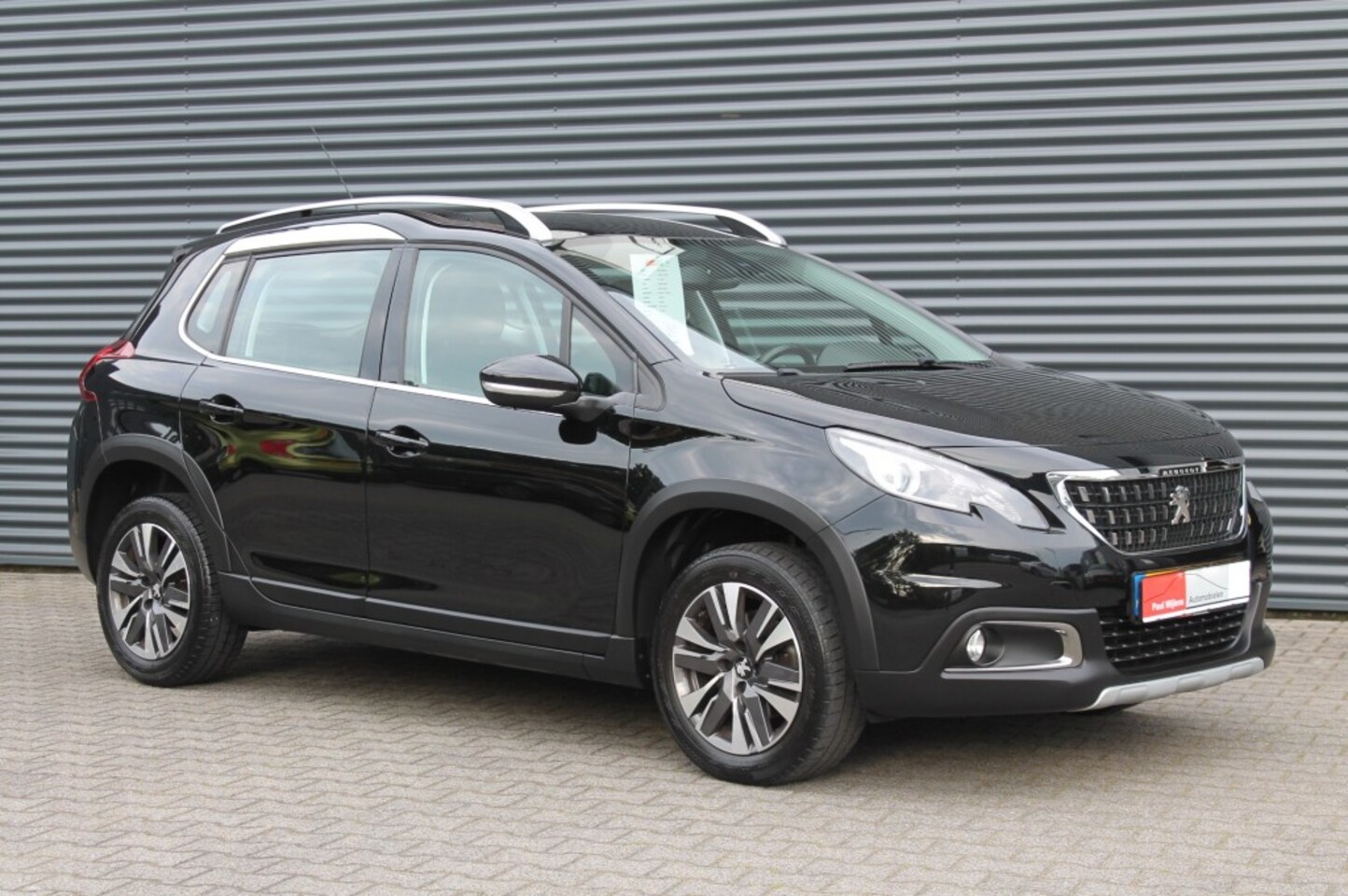 Peugeot 2008 - 1.2 PureTech Allure Uitv. NAVIGATIE - AutoWereld.nl