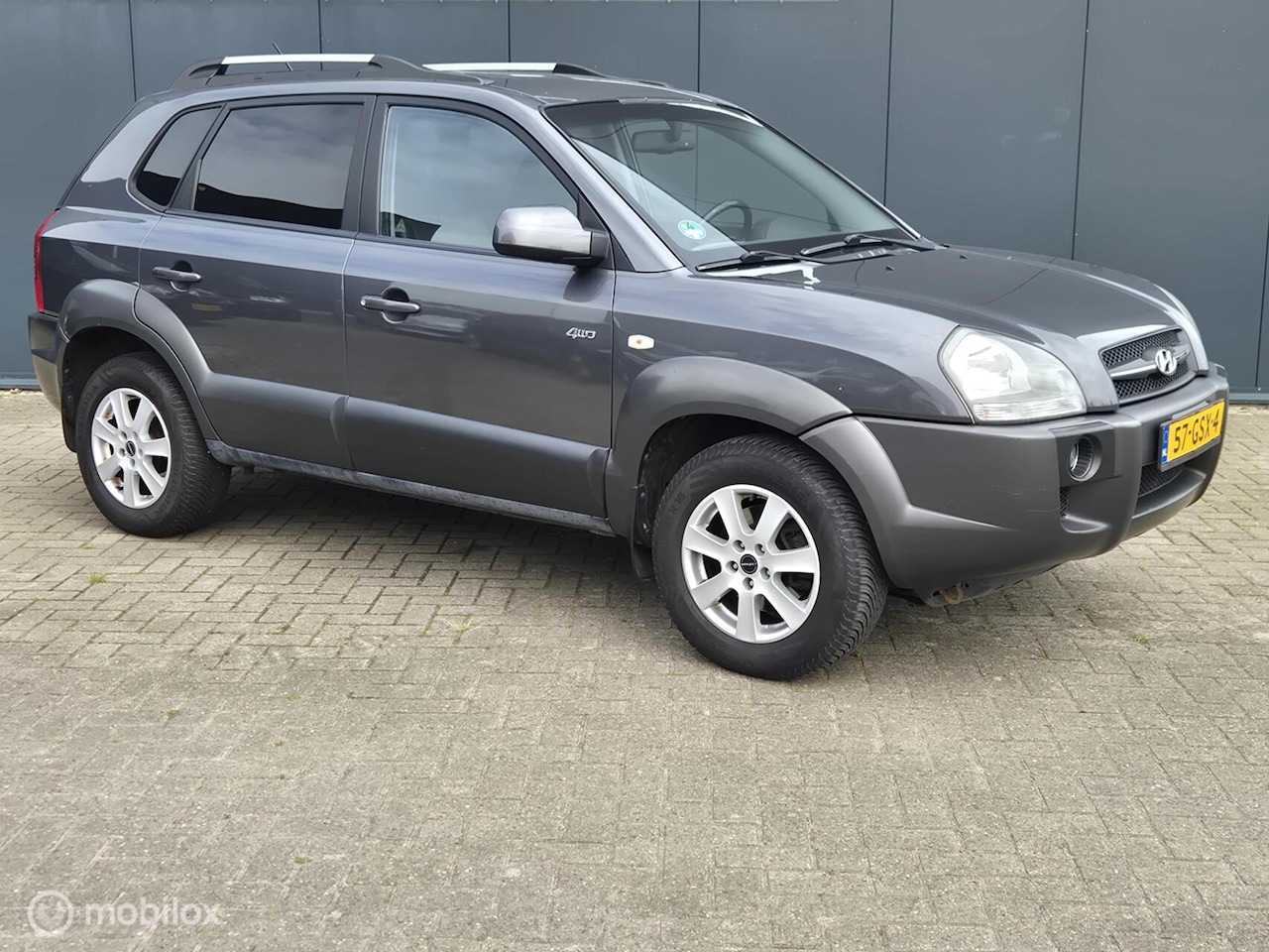 Hyundai Tucson - 2.7i V6 4WD Style|APK 2-2027 - AutoWereld.nl