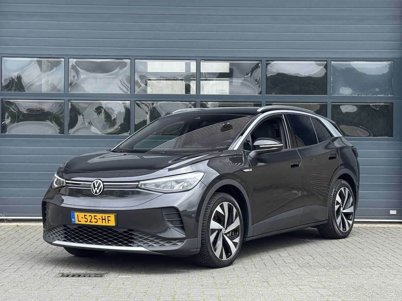 Volkswagen ID.4 - FIRST 77 kWh (SOH 89%) I AUTOMAAT I TREKHAAK I WARMTEPOMP I P-CAMERA I STOELVERWARMING - AutoWereld.nl